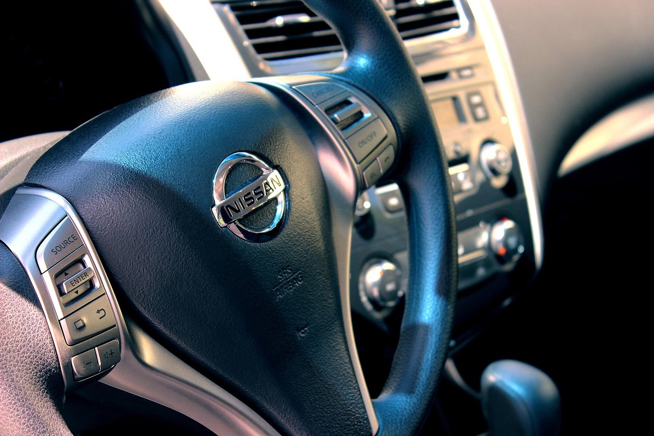 Nissan, car, automobile — Seasonal Radiator Care for Service Vehicles: Optimizing Efficiency in both Hot and Cold Conditions